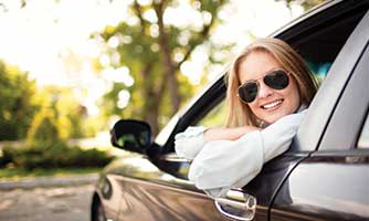 Woman looking out of car window