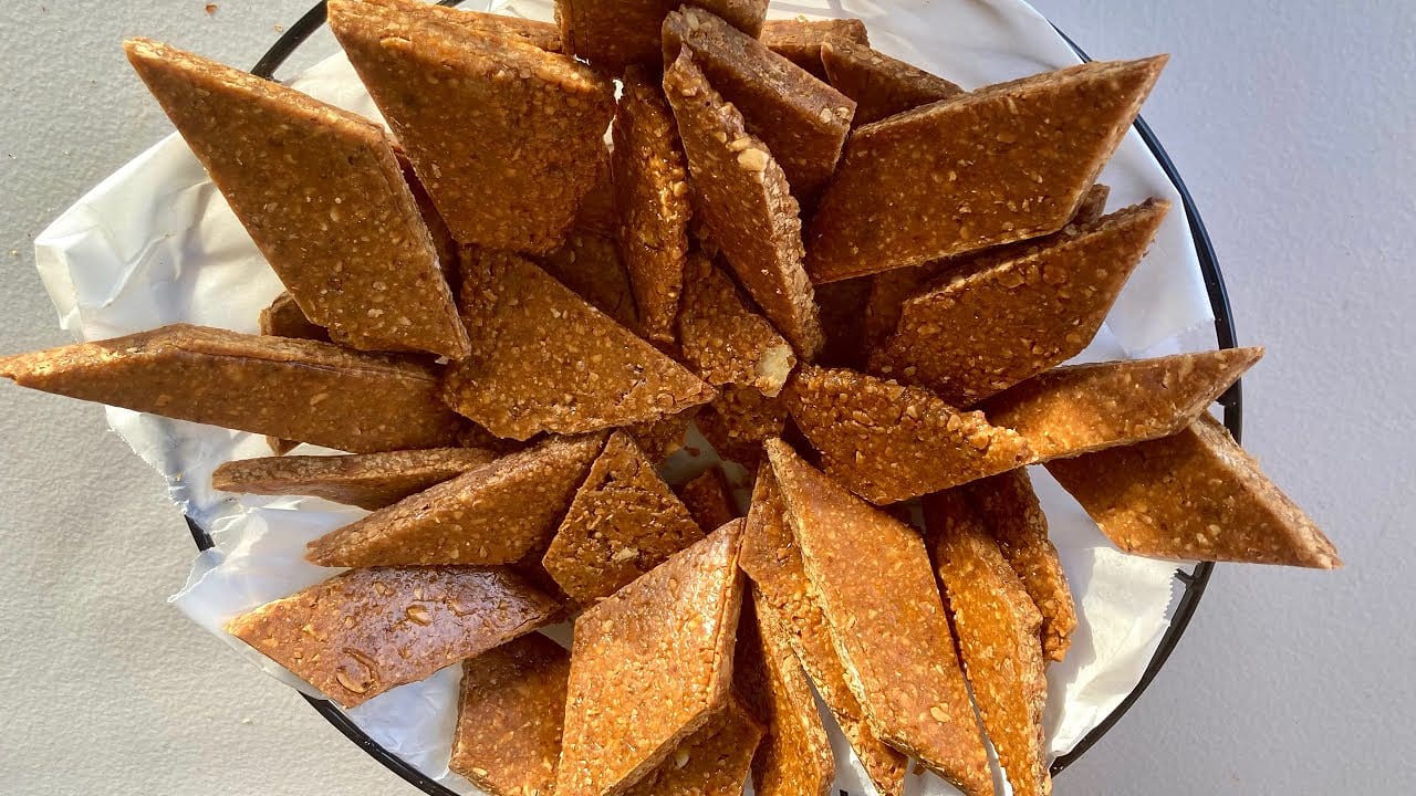 Pieces of Ghanaian nkatie cake made with peanuts and caramelised sugar