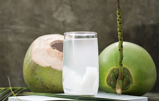 Fresh coconut prepared as a drink in Ghana