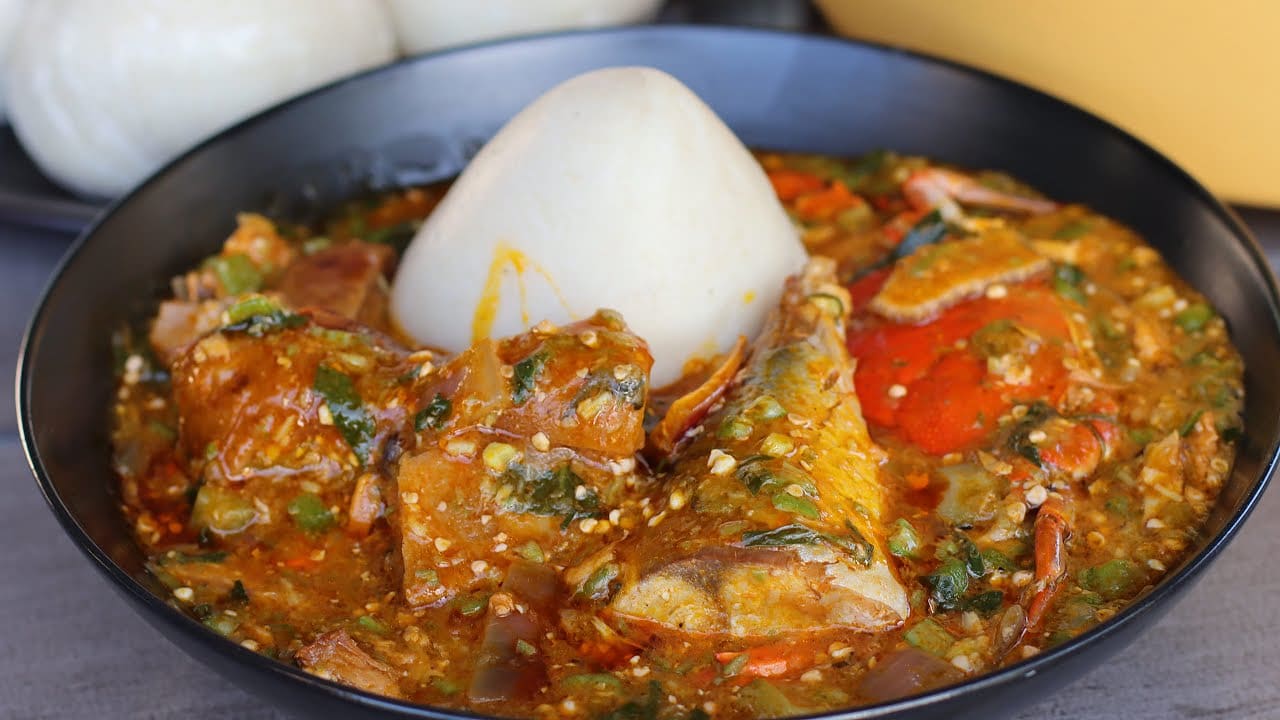 Banku served with Ghanaian okro stew and anchovies