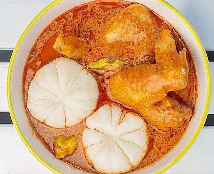 Ghanaian banku served in groundnut soup