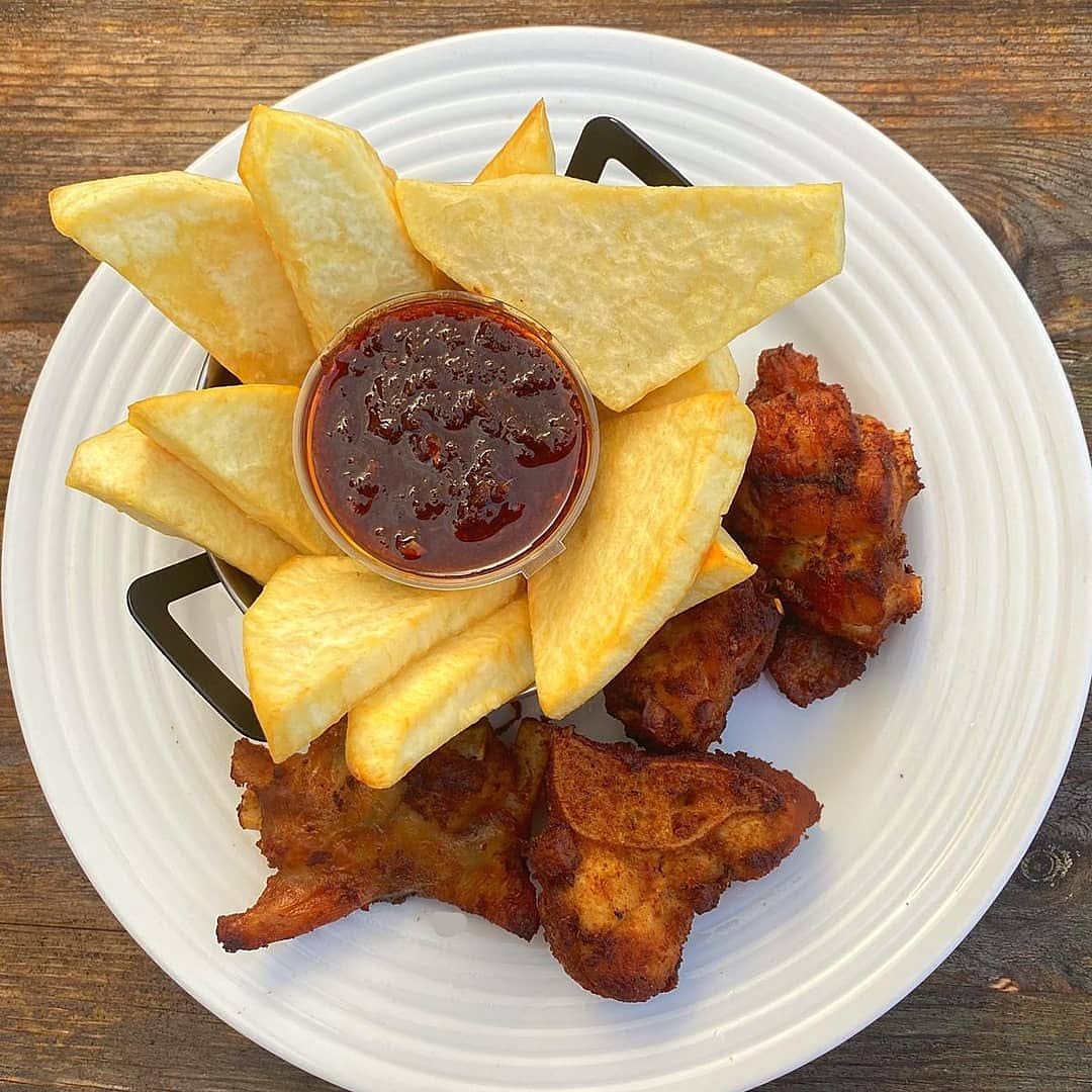 Golden pieces of fried yam served in Ghana