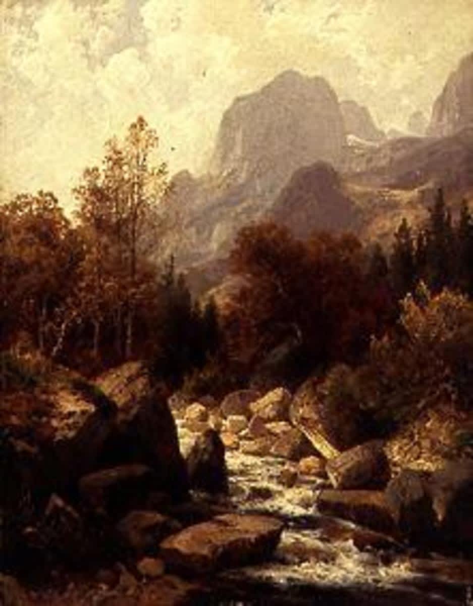 Gebirgsbach im herbstlichen Sonnenlicht