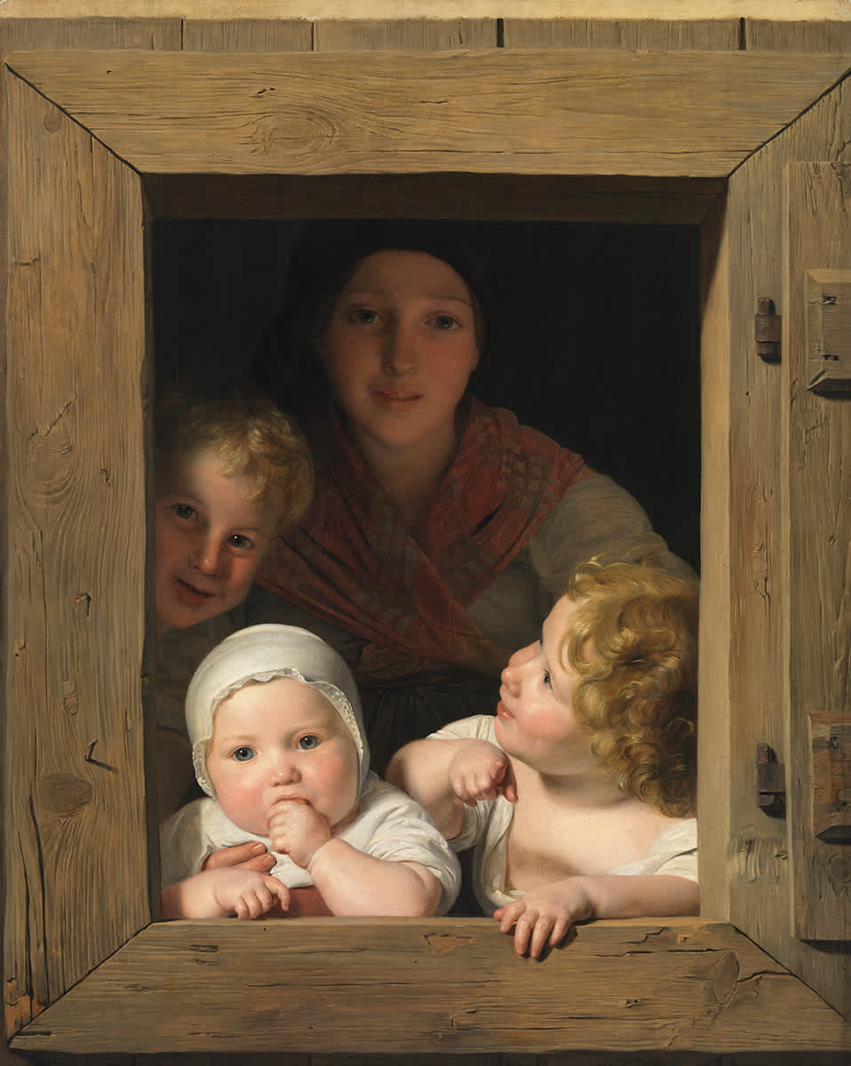 Junge Bäuerin mit drei Kindern im Fenster