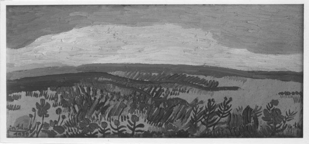 Rote Blumen in der Landschaft