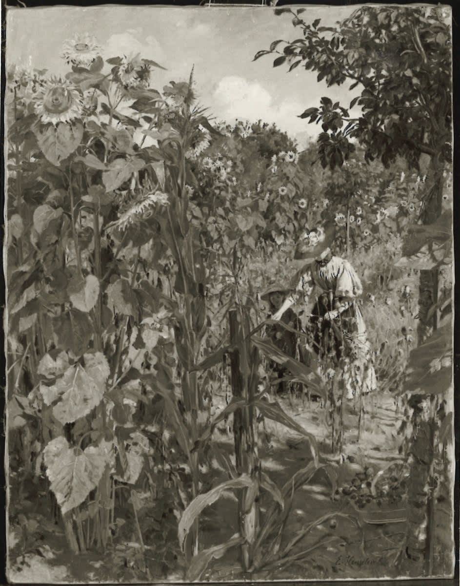 Mutter und Tochter im Sonnenblumengarten