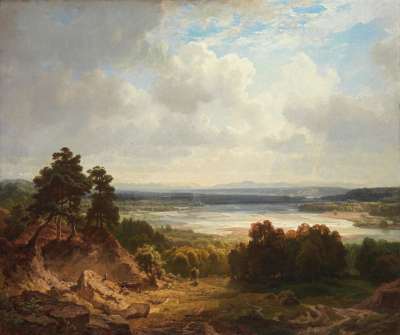 Das Isarbett bei München mit Aussicht auf die bayerischen Alpen