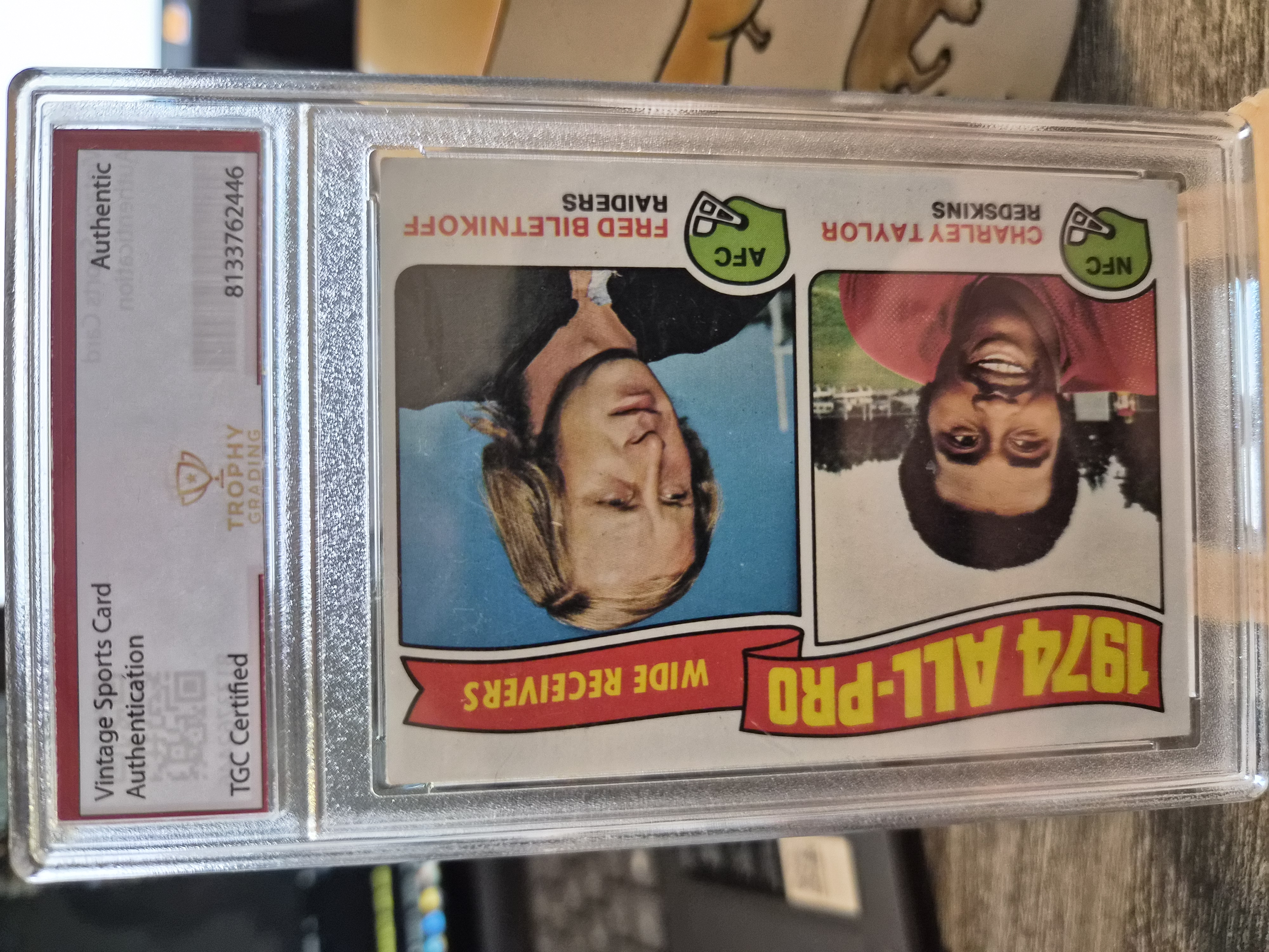 1975 Topps #201 1974 All-Pro Wide Receivers featuring Hall of Famers Fred Biletnikoff (Raiders) and Charley Taylor (Redskins)