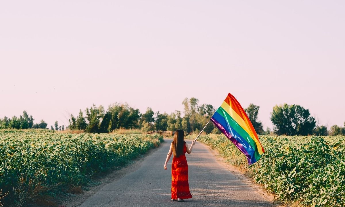 woman-with-lgbtq-flag