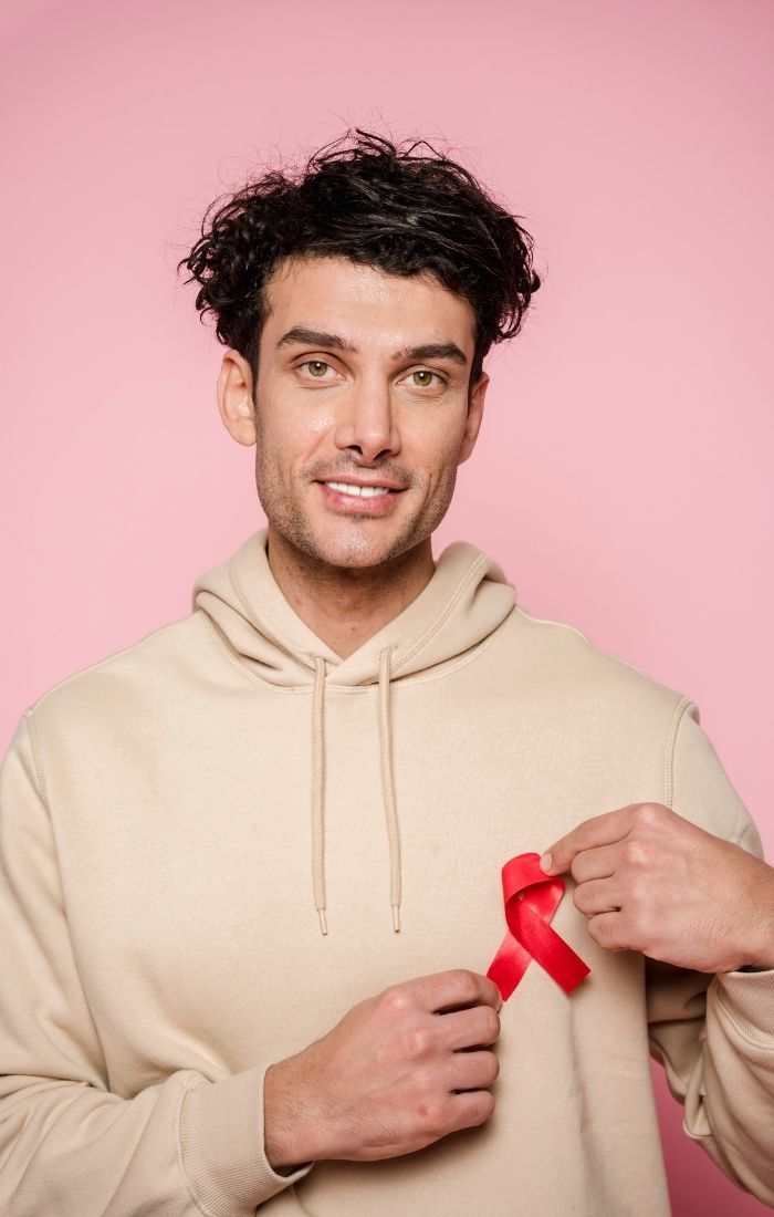 guy with AIDS ribbon