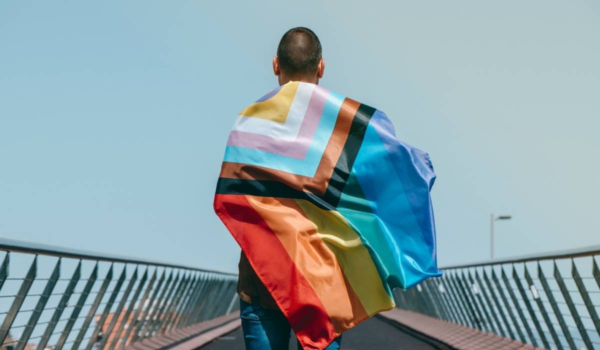 men with the progressive flag