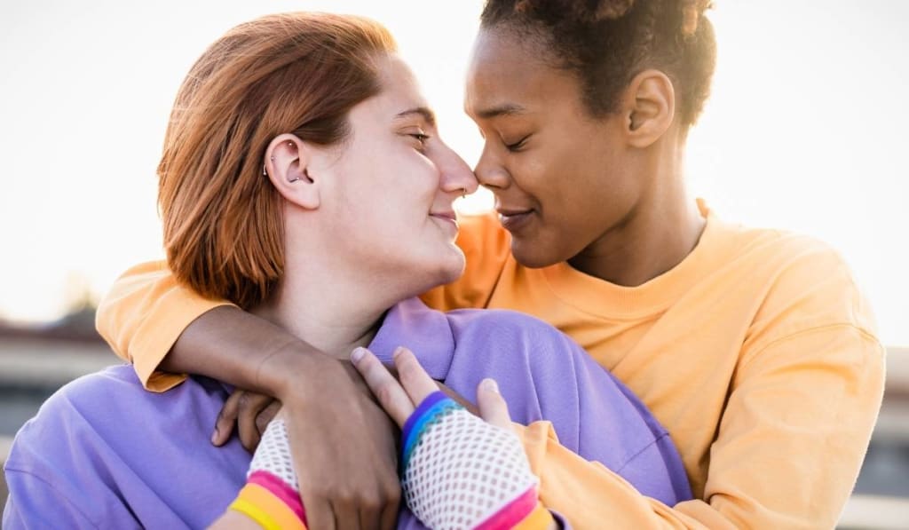 couple of two women hugging
