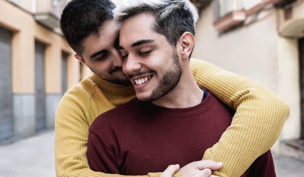 gay couple hugging