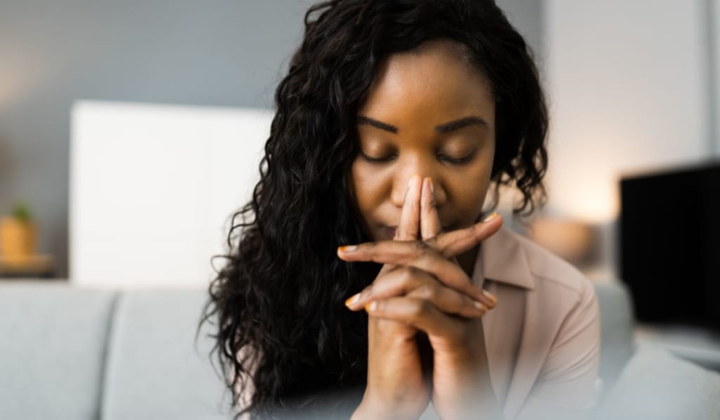 Woman Praying Closeup