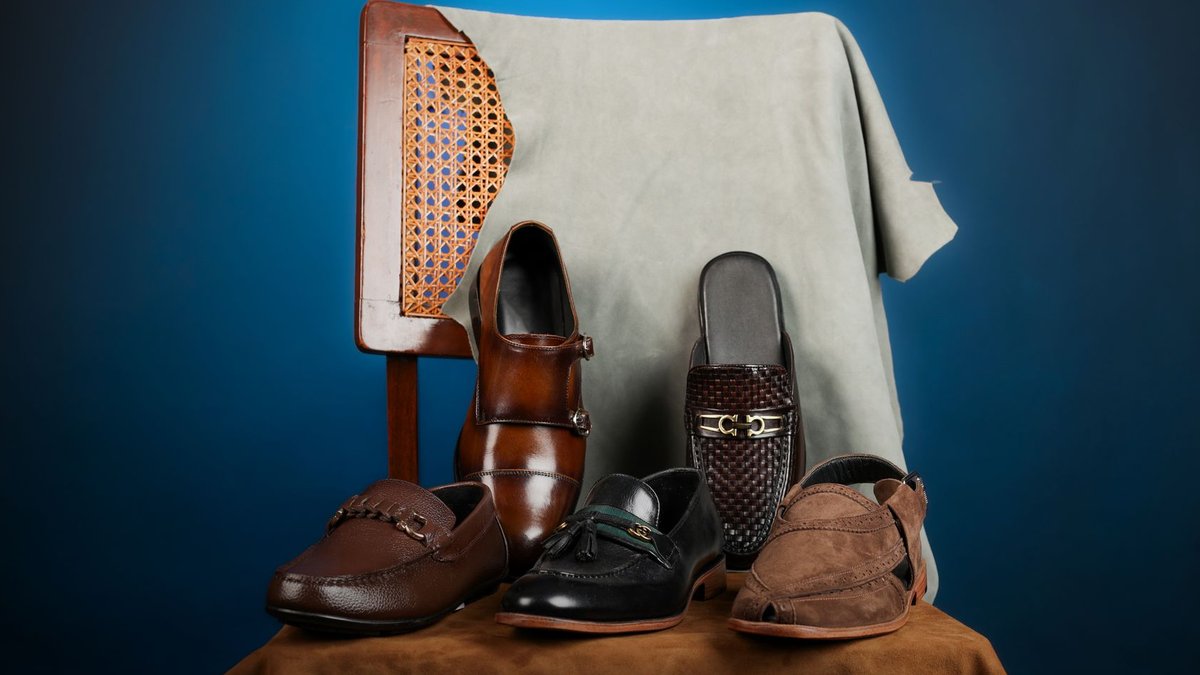 Stylish collection of men's leather dress shoes on a chair, perfect for fashion and formal occasions.
