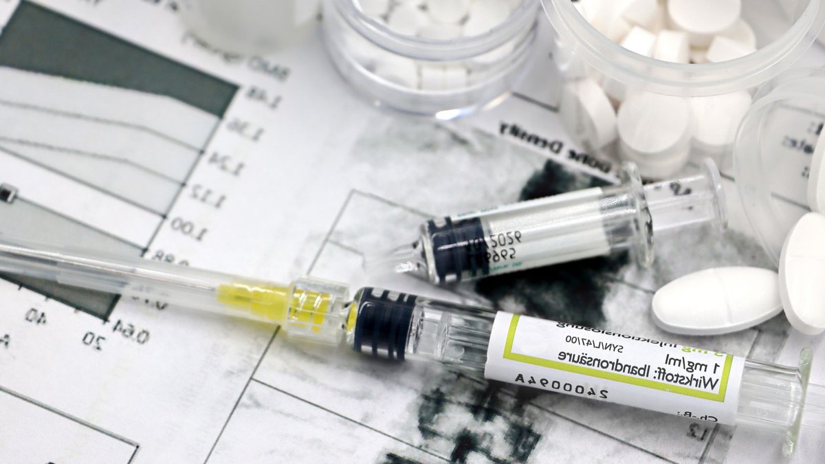 Bristol Myers reports progress in multiple myeloma trial Medical arrangement of osteoporosis treatment tools with injections and pills.