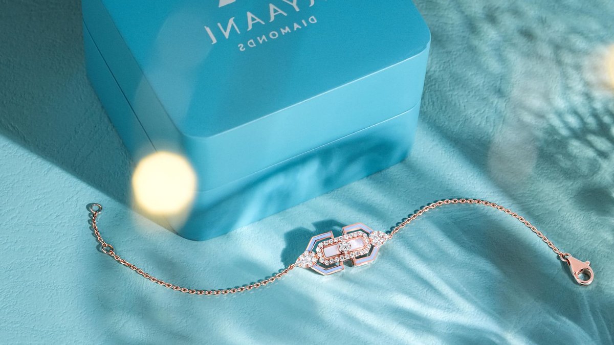 Elegant diamond bracelet displayed alongside a branded box, perfect for luxury gifting.