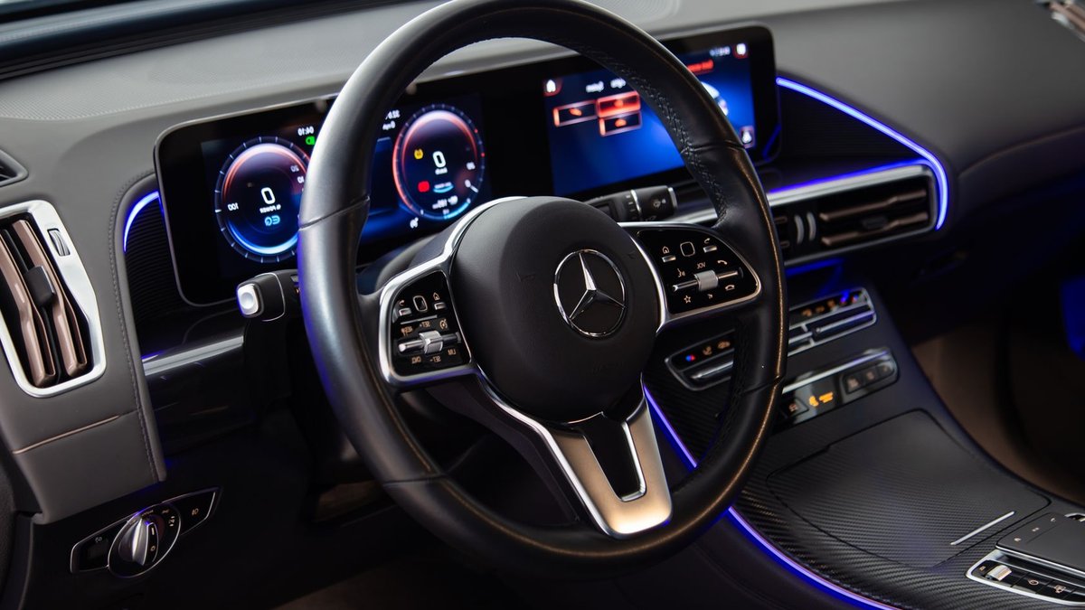 Mercedes-Benz Confirms New GLC 400 BEV for India Close-up view of a luxury Mercedes-Benz car interior featuring a sleek dashboard and modern technology.