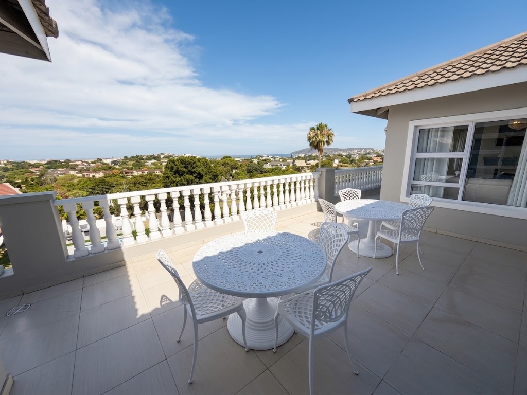 Outdoor Deck with tables overlooking Plettenberg Bay