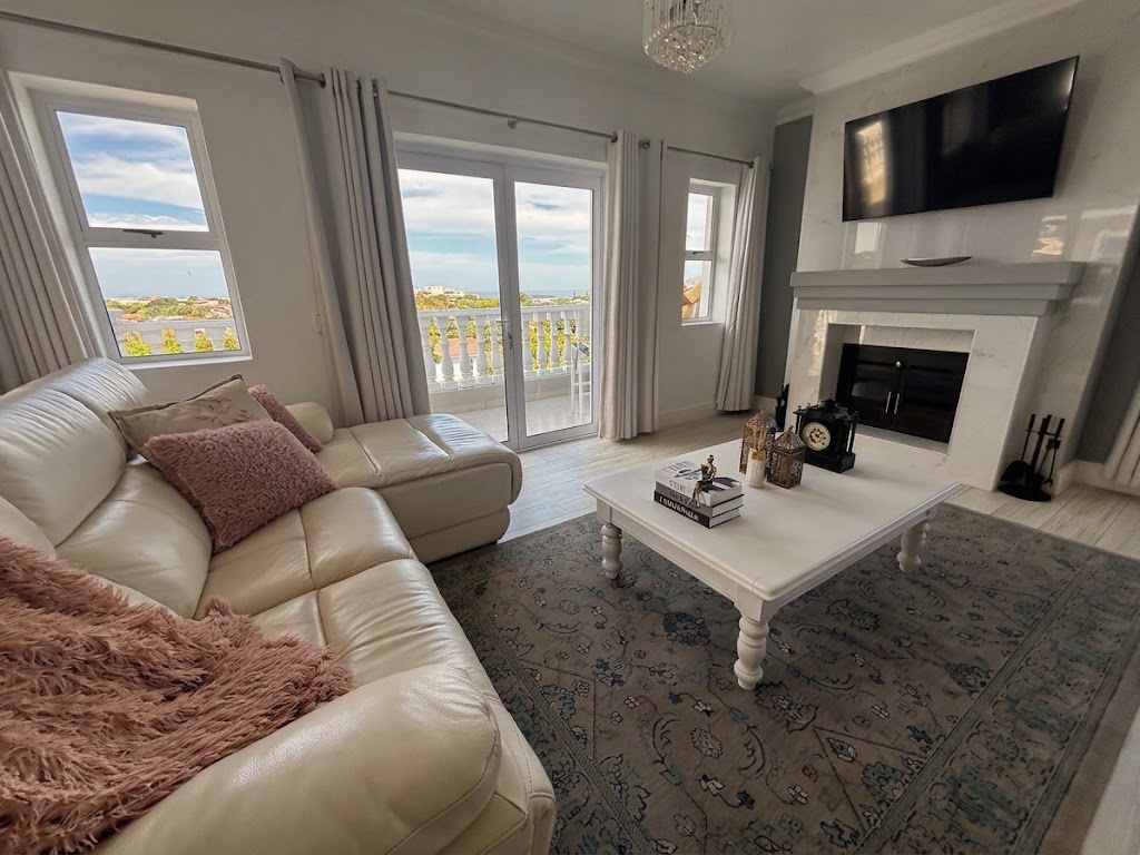 Presidential Suite sitting area opening to the deck