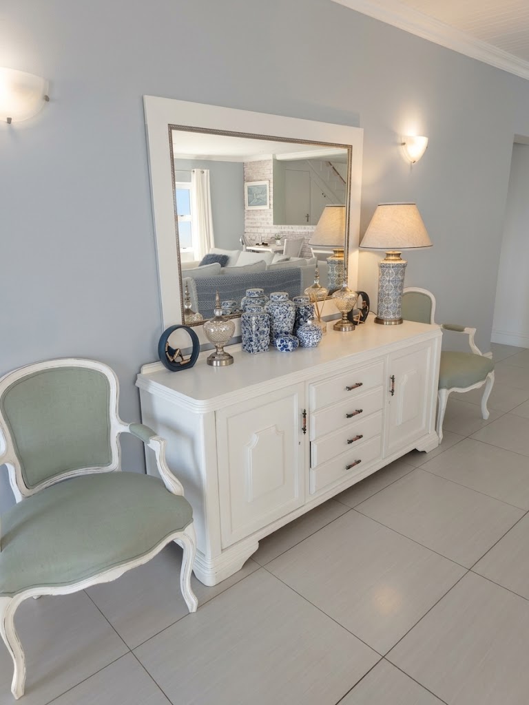 Decorative sideboard and reading chair in the Grand Lounge