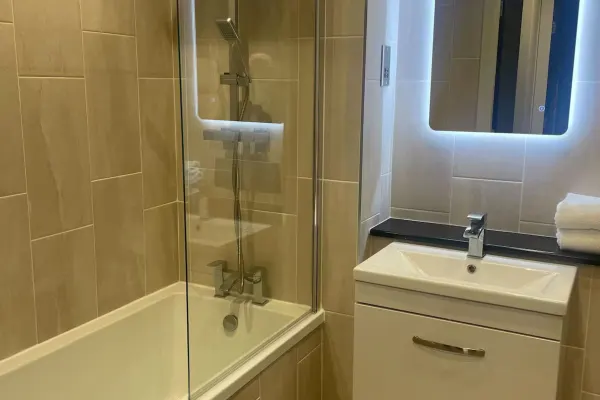 1BR Apt • Balcony • Smart TVs in All Rooms - Image 5