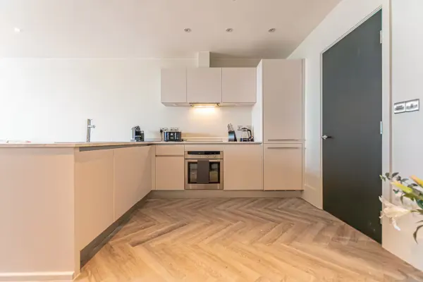 1BR Apt • Balcony • Smart TVs in All Rooms - Image 7