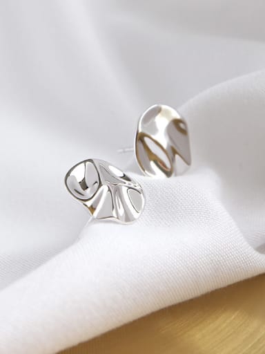 Sterling silver irregular bump surface geometry round ear stud