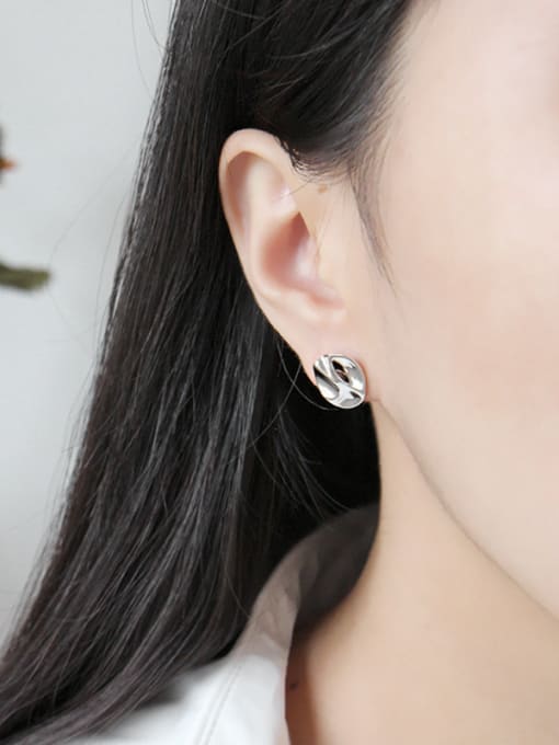 Arya Sterling silver irregular bump surface geometry round ear stud