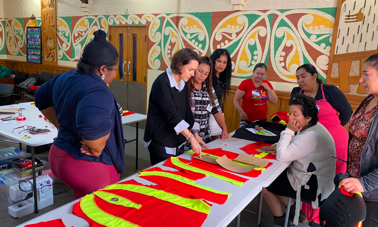 Group of migrant women working on a textile project