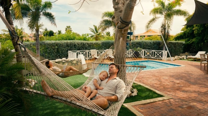 An afternoon hammock nap beside the estate pool.