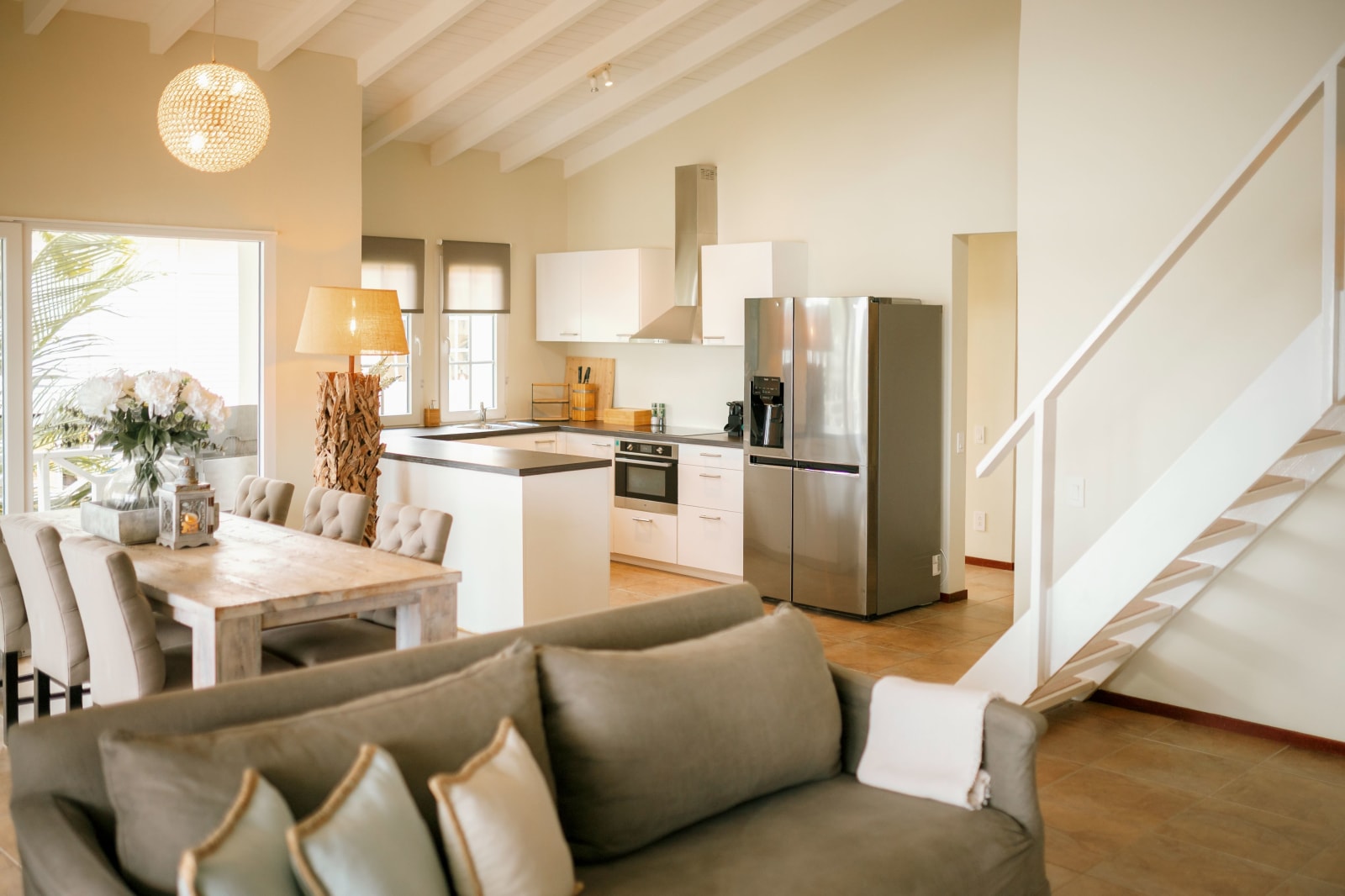 Open-plan living room at Sunshine Bay with Smart TV and Sonos.