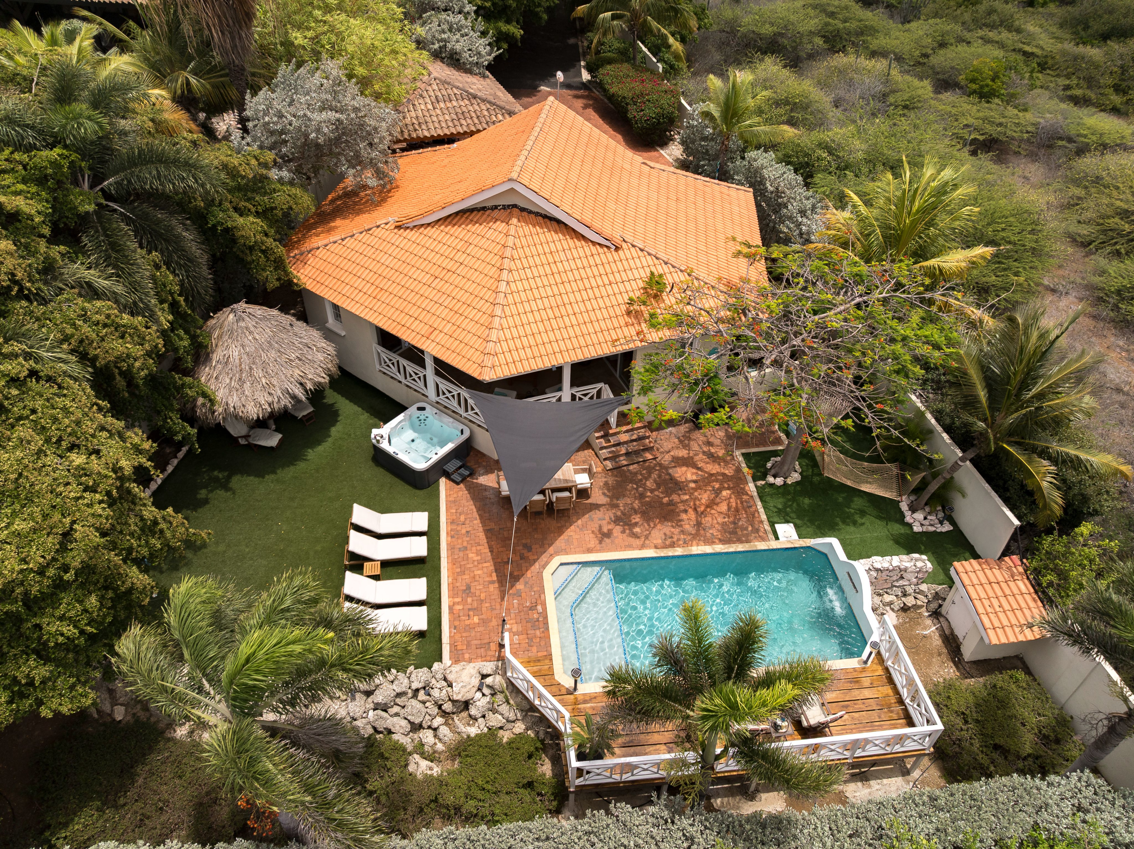 The garden and private pool at Palm Breeze estate, Jan Thiel, Curaçao
