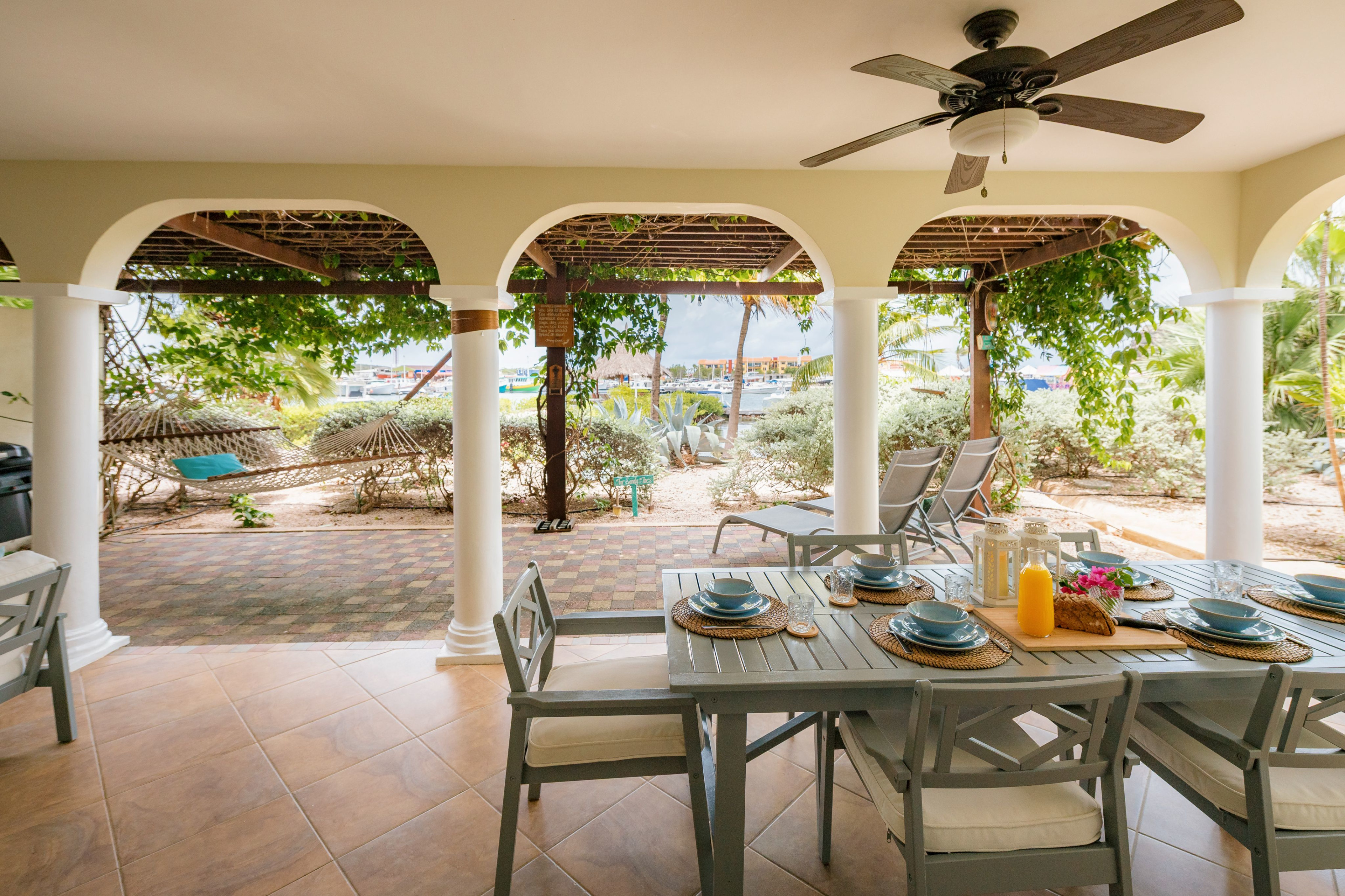Lush garden wrapping the pool at Tropical Haven estate, Jan Thiel, Curaçao