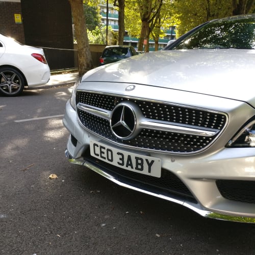 A close-up of a car number plate