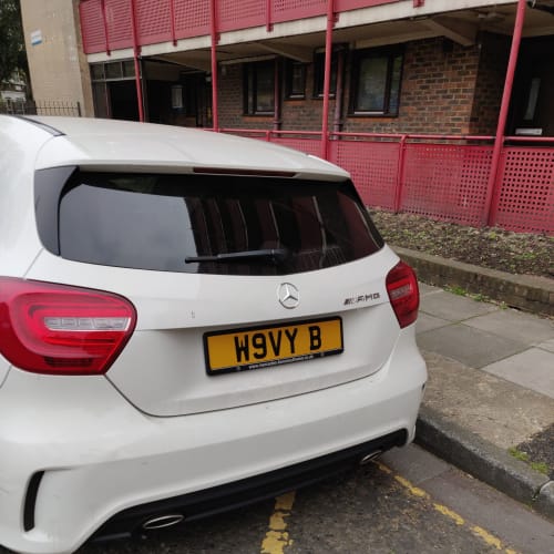 A close-up of a car number plate