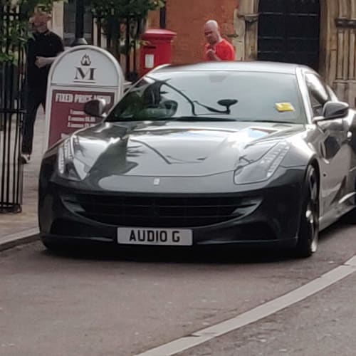 A close-up of a car number plate