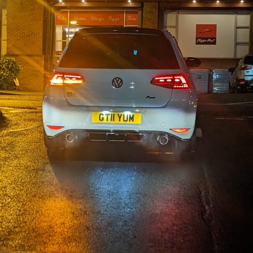 A close-up of a car number plate