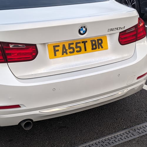 A close-up of a car number plate