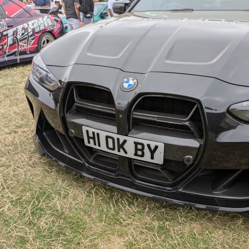 A close-up of a car number plate