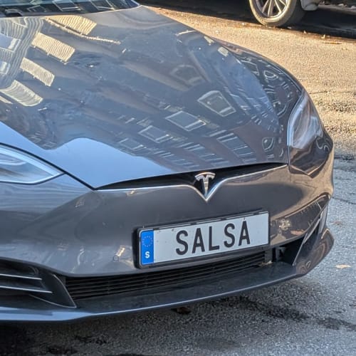 A close-up of a car number plate