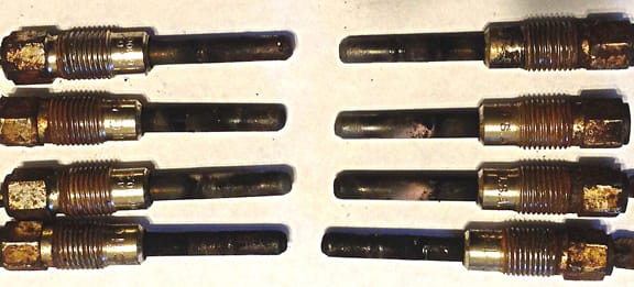 GMC diesel glow plugs: several of these glow plugs were dead and can be noted by the excessive carbon deposits on several plugs