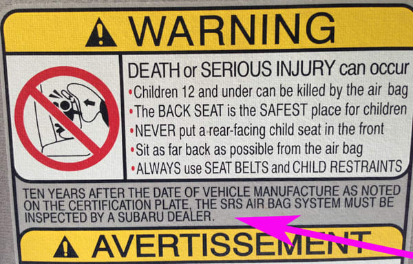 Airbag system warning label as found in 2001 Subaru Outback. How important is it to heed this warning? On this car, as long as the warning lamp goes off a few seconds after start up then it's all systems go and not likely needing any dealer inspection.