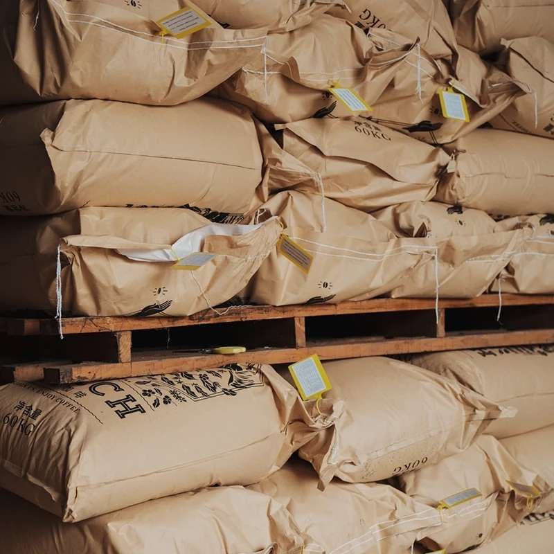 Burlap bags of green coffee at origin