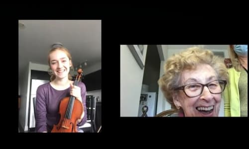 A screenshot of a virtual call between a TSYO member and a senior citizen