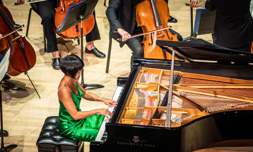 Yuja Wang performing on the piano with the TSO