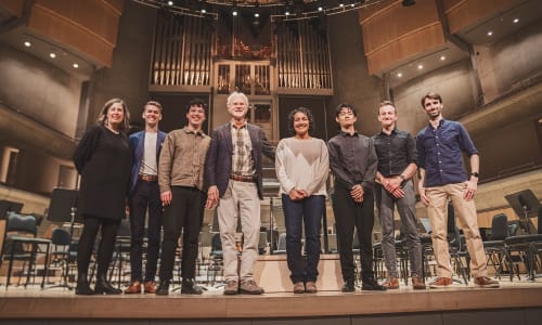 Participants in Explore the Score on stage together