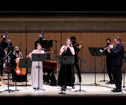 A small group of TSO musicians on stage performing