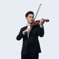a man playing the violin