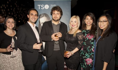 Pianist Lukas Geniušas (centre) with Impresarios Club members at an IC Concert Social